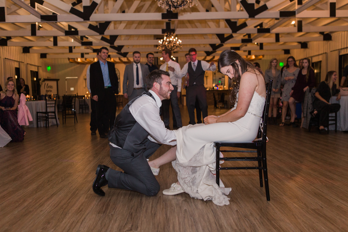 garter toss wedding reception photo