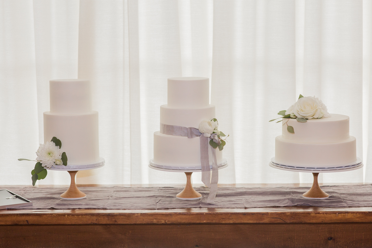 three wedding cakes