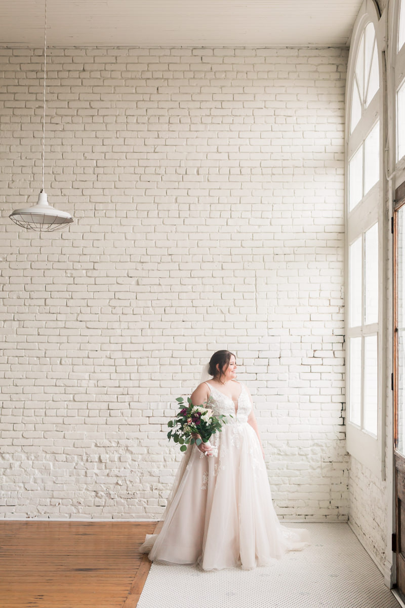 Minimalistic white brick wall wedding venue austin hutto texas