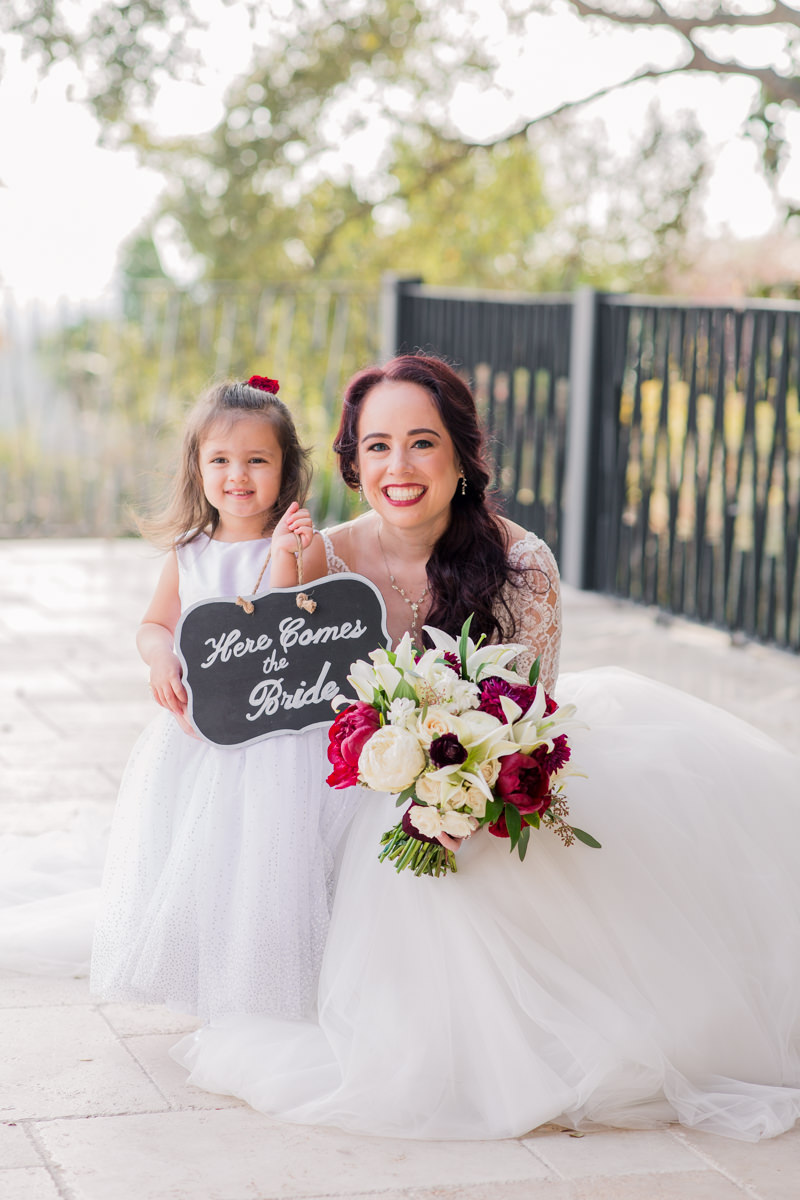 flower girl wedding day with bride