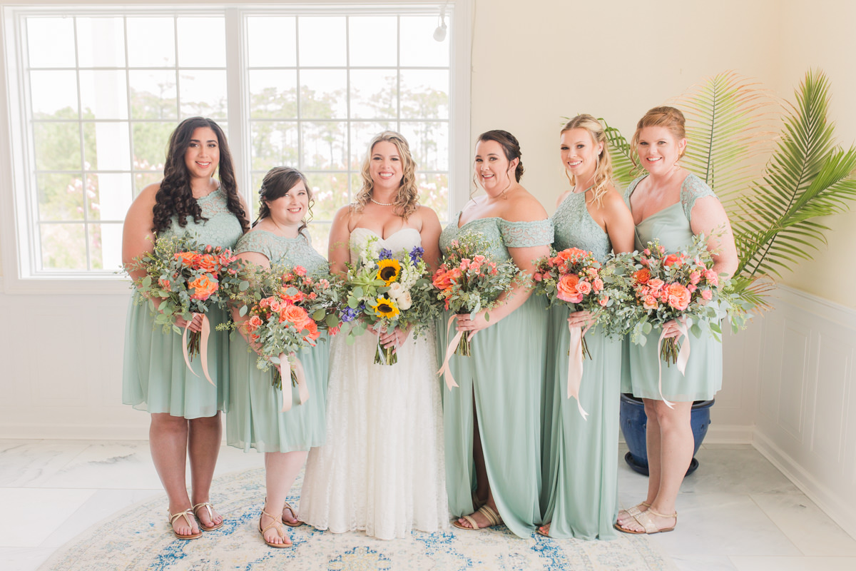 colorful bright orange yellow red bridesmaids bouquet pictures