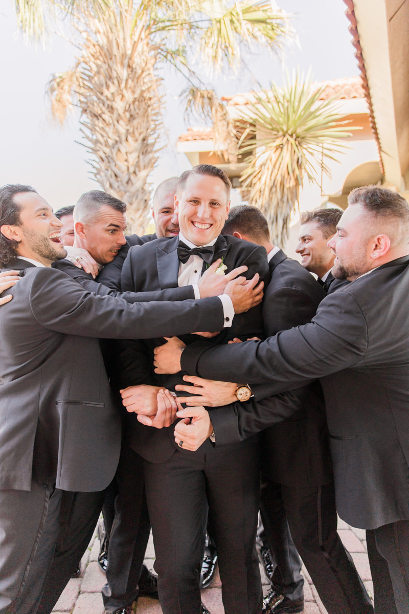 groomsmen hug 