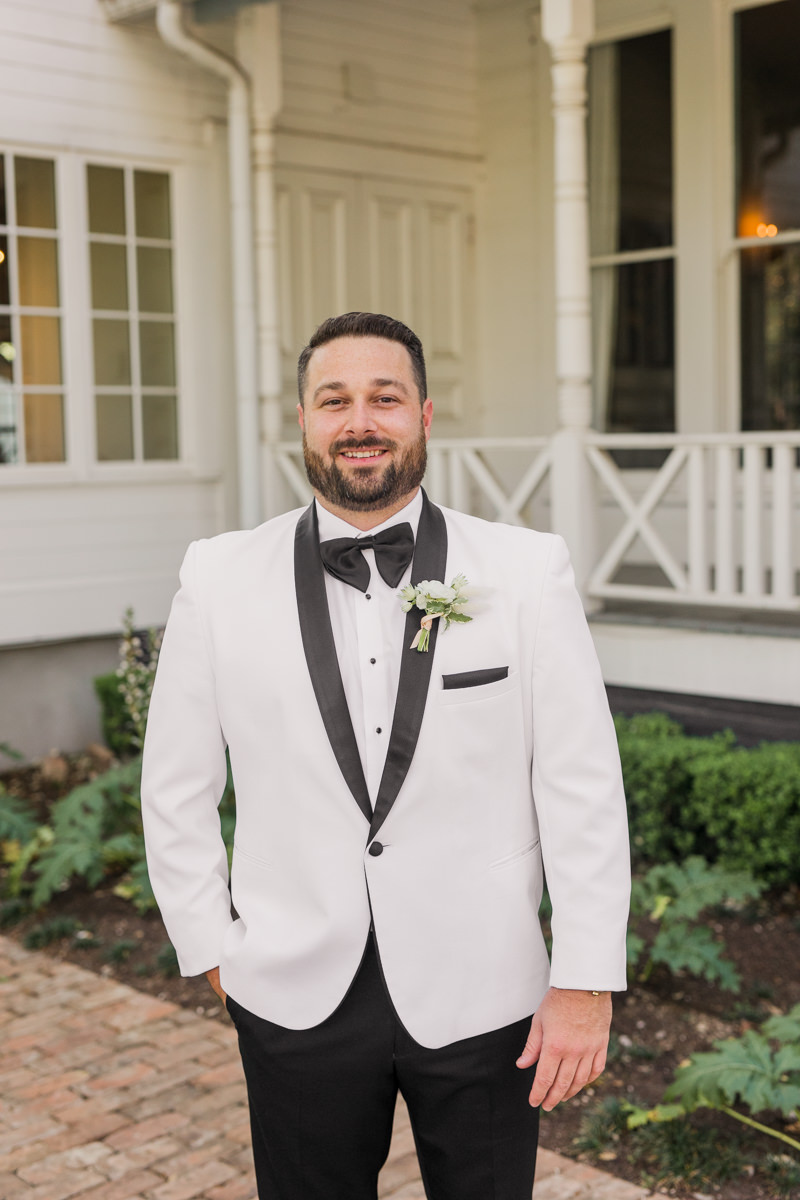 groom white tux suit