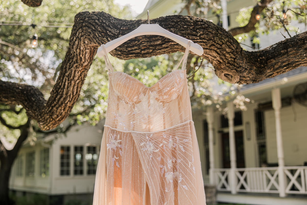 wedding dress hanging photo