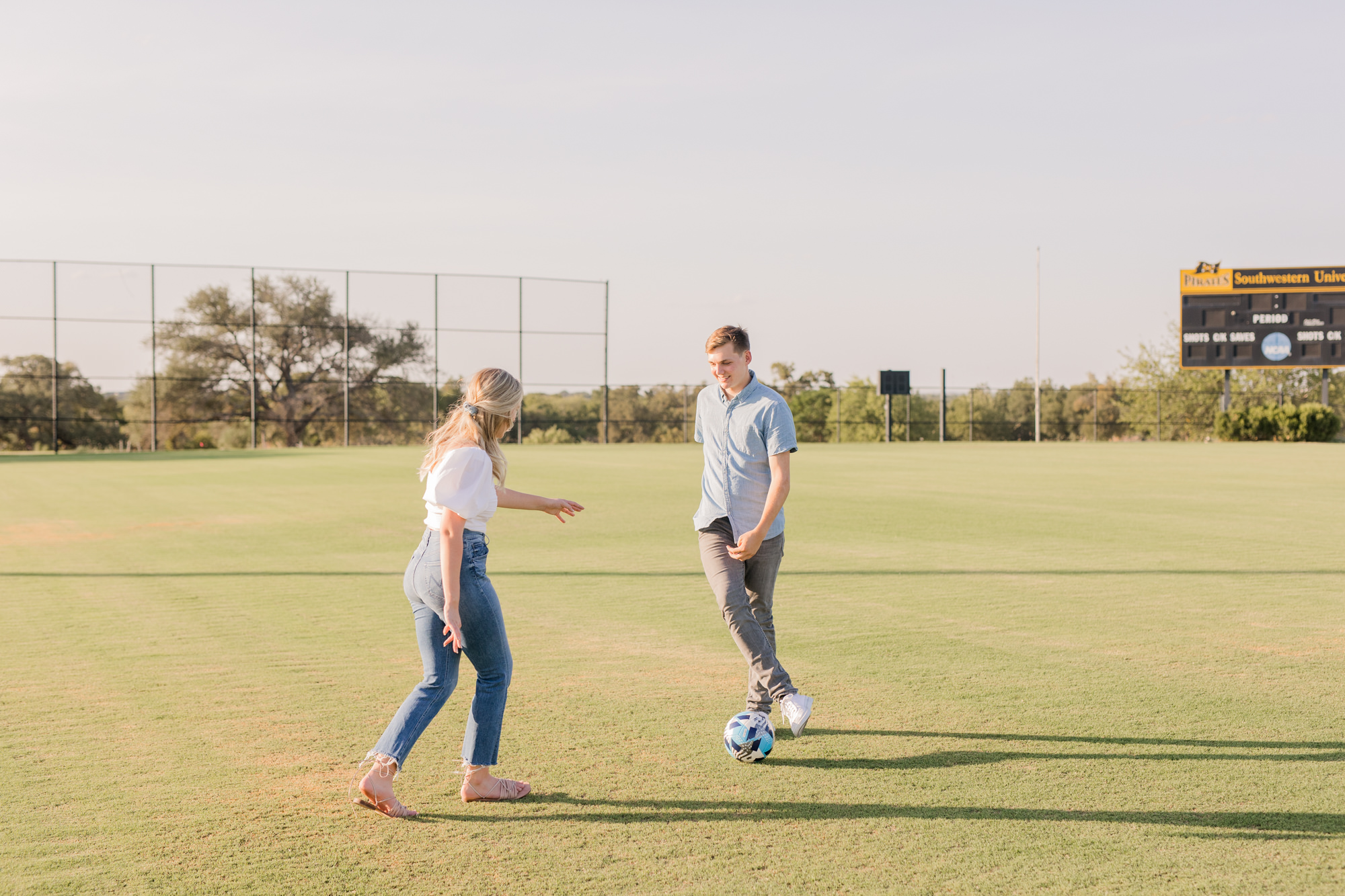 Southwestern University + Blue Hole Georgetown Engagement Photos - Soccer Field