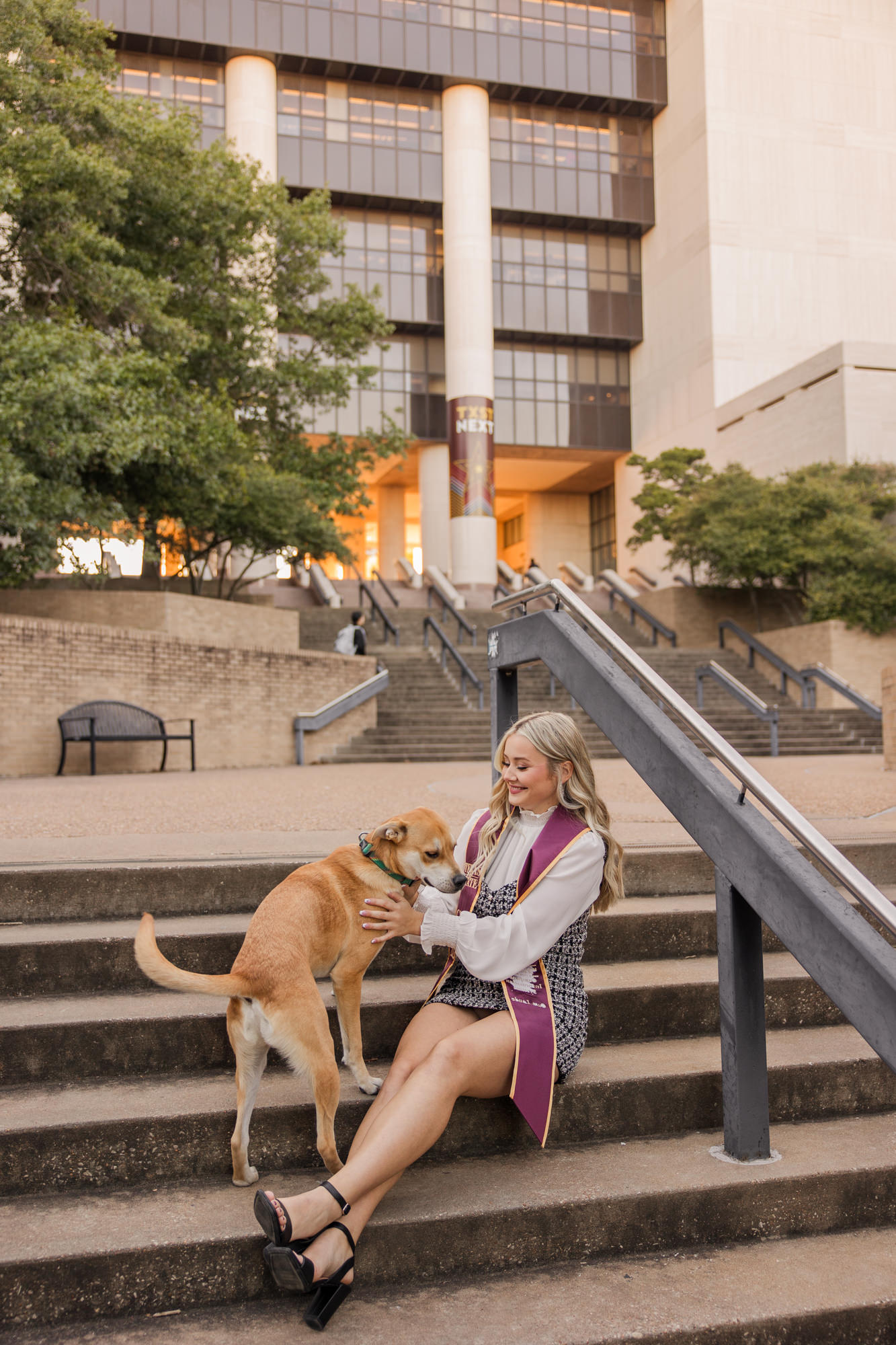 Texas State grad pictures with dog
