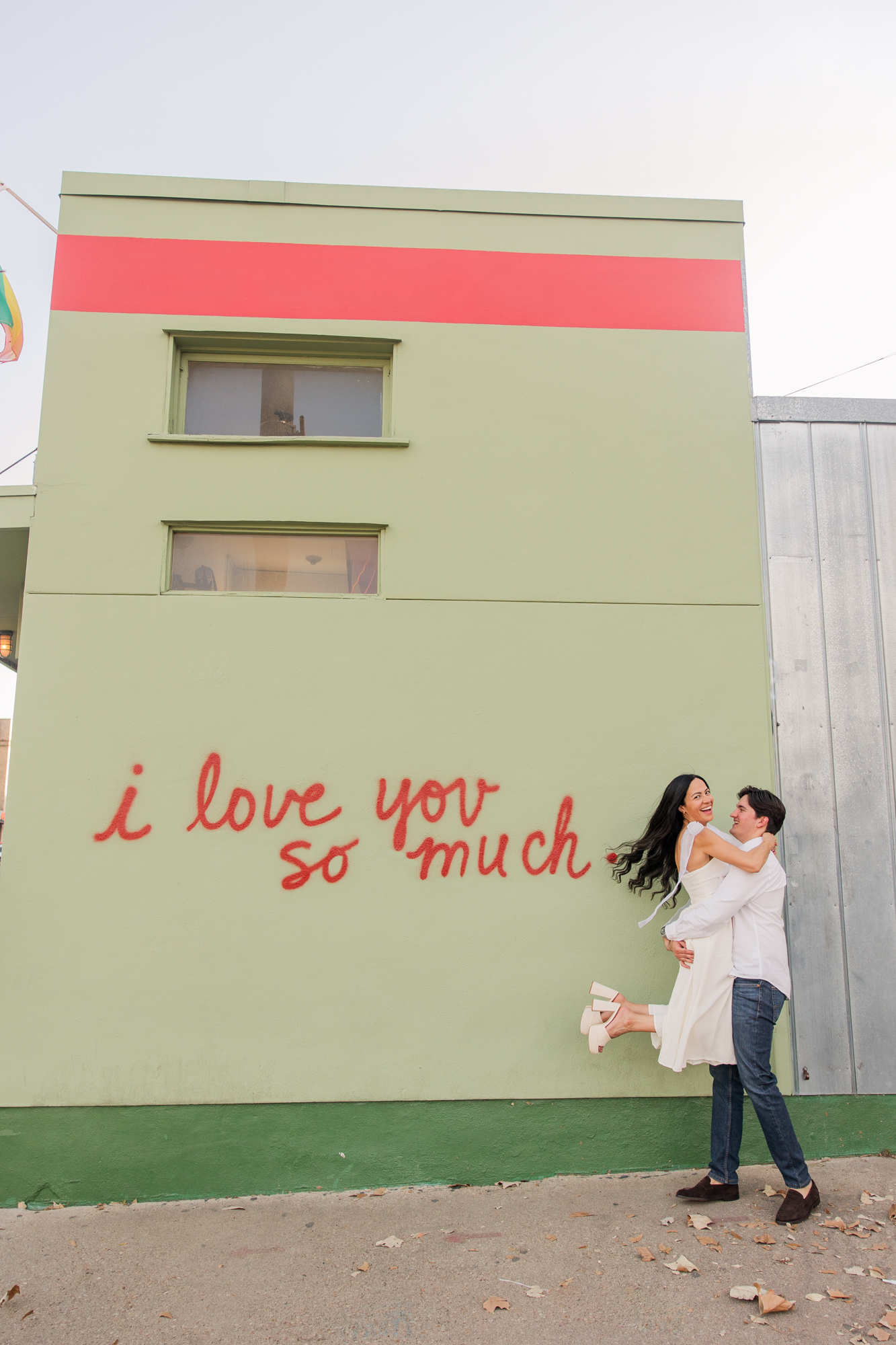I love you so much wall | Colorful South Congress Engagement Photos
