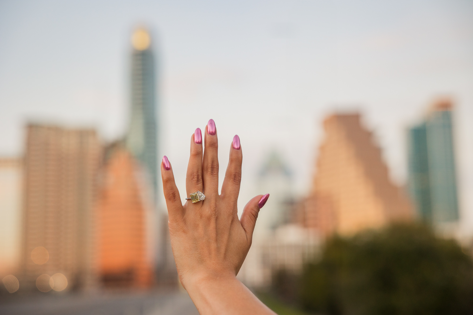 Colorful South Congress Engagement Photos | downtown skyline
