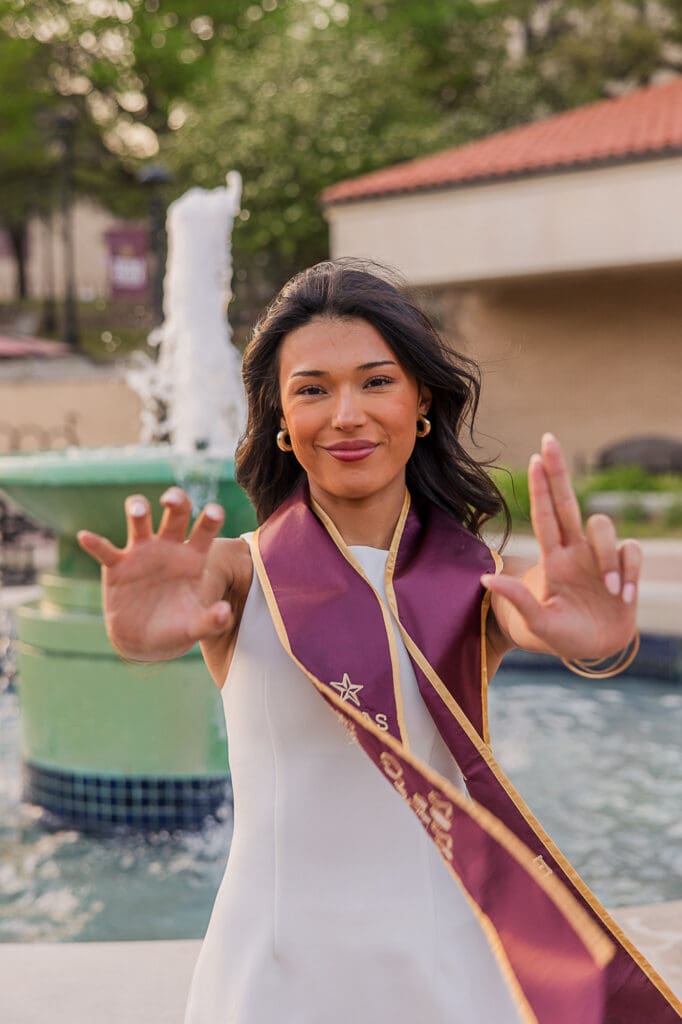 Texas State Grad fountain champagne popping photo